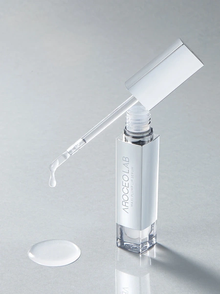 Arocell Сыворотка-блеск с эффектом увеличения объема губ – прозрачный Maxi Plump Lip Serum – Clear 2.5 гр фото 1